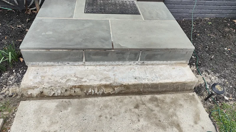 Exterior stone steps before repair